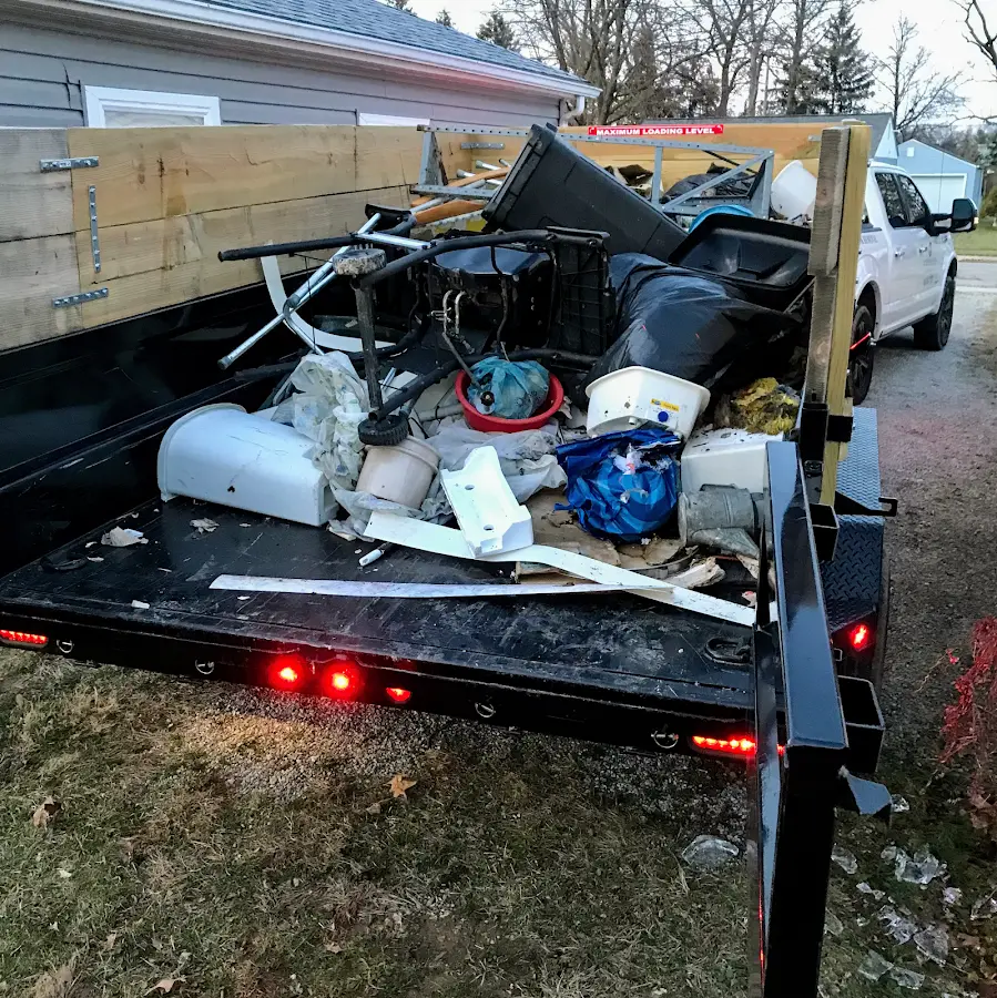 Roll-off dumpster delivered to a residential driveway in Pomfret